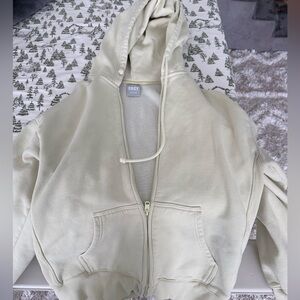 yellow aritzia zip up